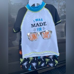 NWT’s Boys 2 pc Swim Suit, Colorful Palm Trees, Size 3T.